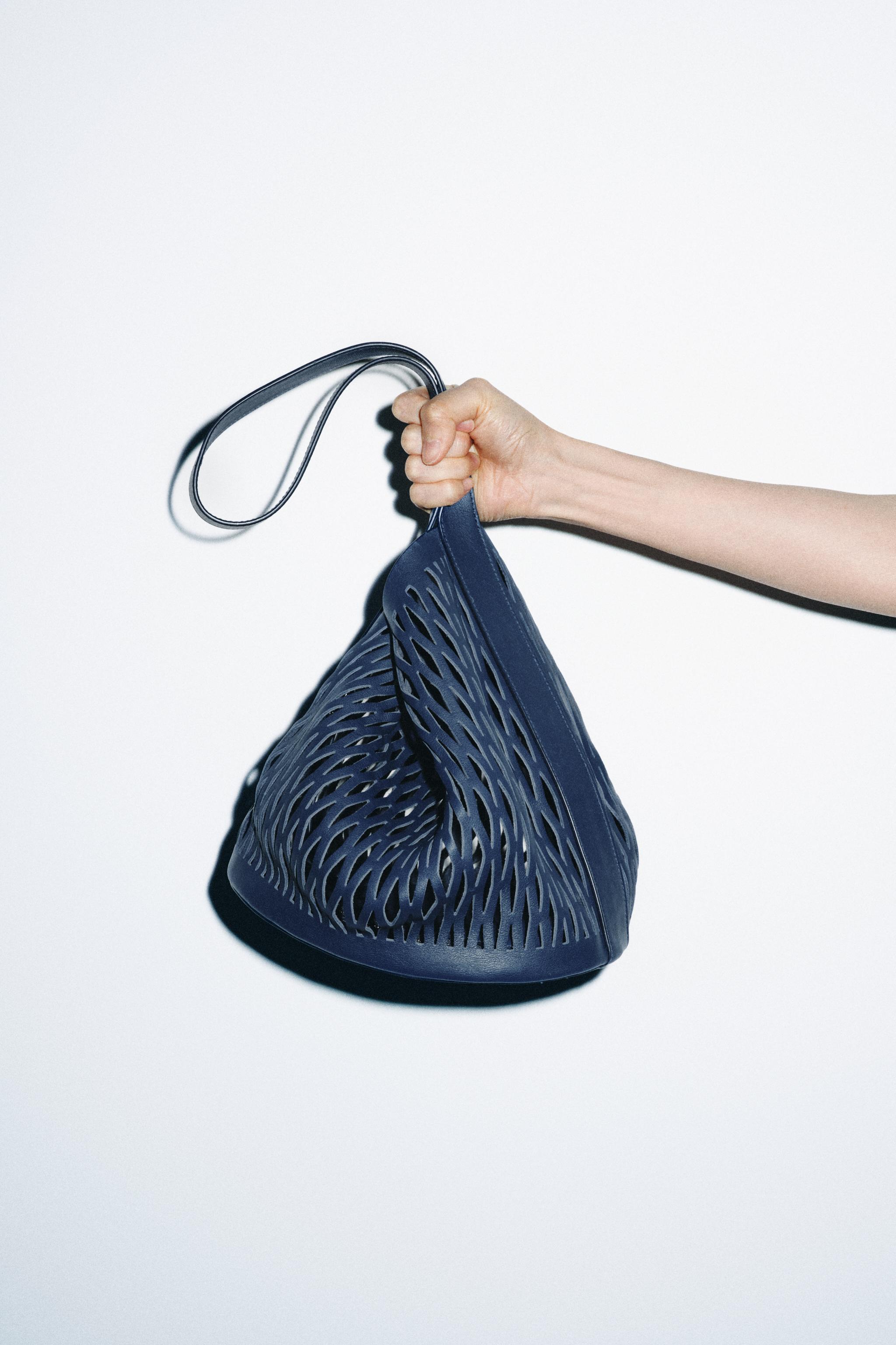 DIE-CUT LEATHER BAG